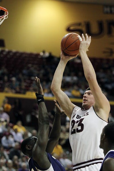 Junior Ruslan Pateev attacks the rim in a game against Washington on Jan. 26. Pateev made all four of his field goal attempts in ASU’s loss to Cal. (Photo by Sam Rosenbaum)