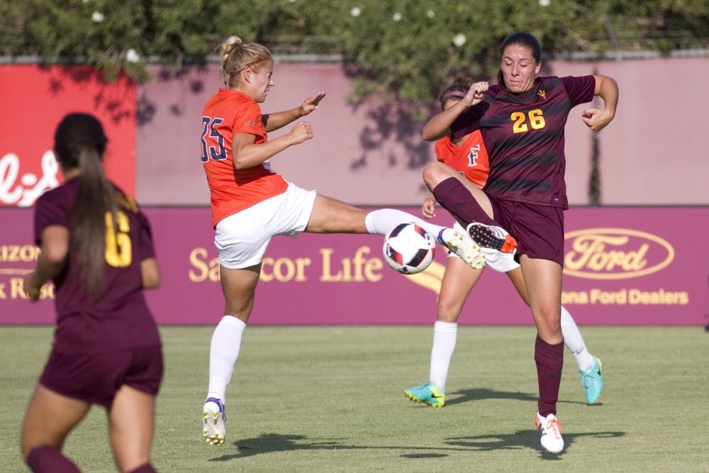 ASU sophomore forward Natalie Stephens goes for a ball in the midfield during a 2-0 win over Cal State Fullerton in Sun Devil Soccer Stadium in Tempe, Arizona, on Friday, Sept. 16, 2016.