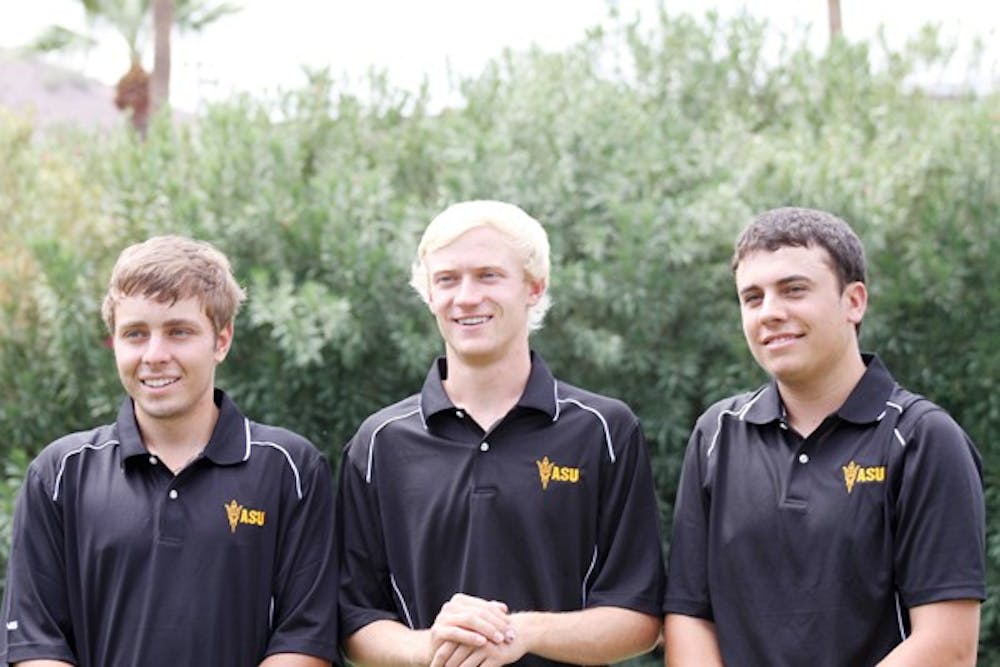 NEW CHAPTER: (From left) Freshmen golfers Austin Quick, Brandon Cloete, and Cameron Palmer pose for a picture before practice on Saturday. The three student-athletes are united on ASU’s men’s team after competing against one another during their high school careers. (Photo courtesy of Maggie Emmons)