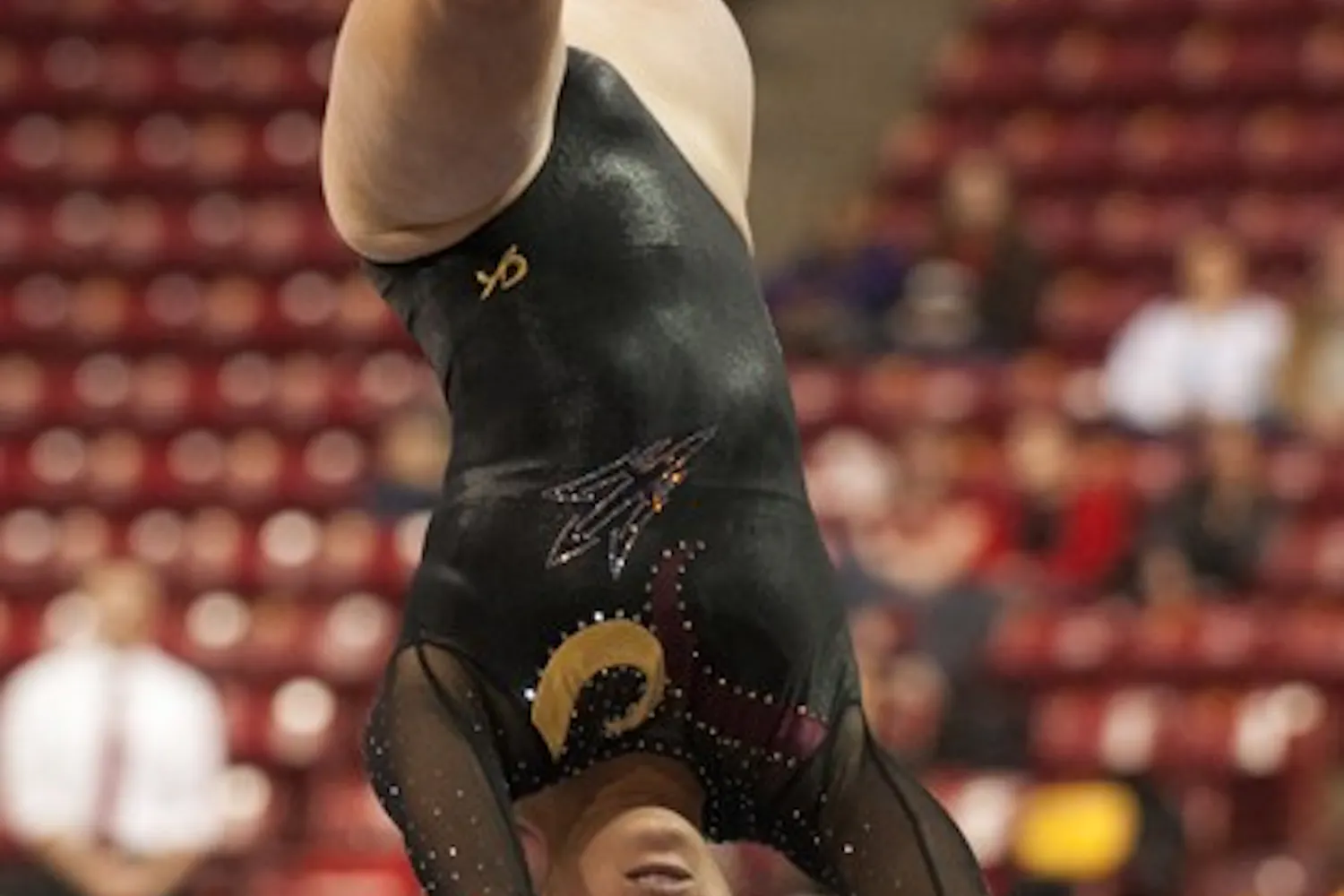 Kahoku Palafox performs a routine on the beams during the Sun Devils’ home meet against No. 4 Oklahoma on Jan. 12. ASU looks to rebound from its loss to the Sooners on the road vs. San Jose State and Sacramento State on Jan. 18. (Photo by Molly J Smith)