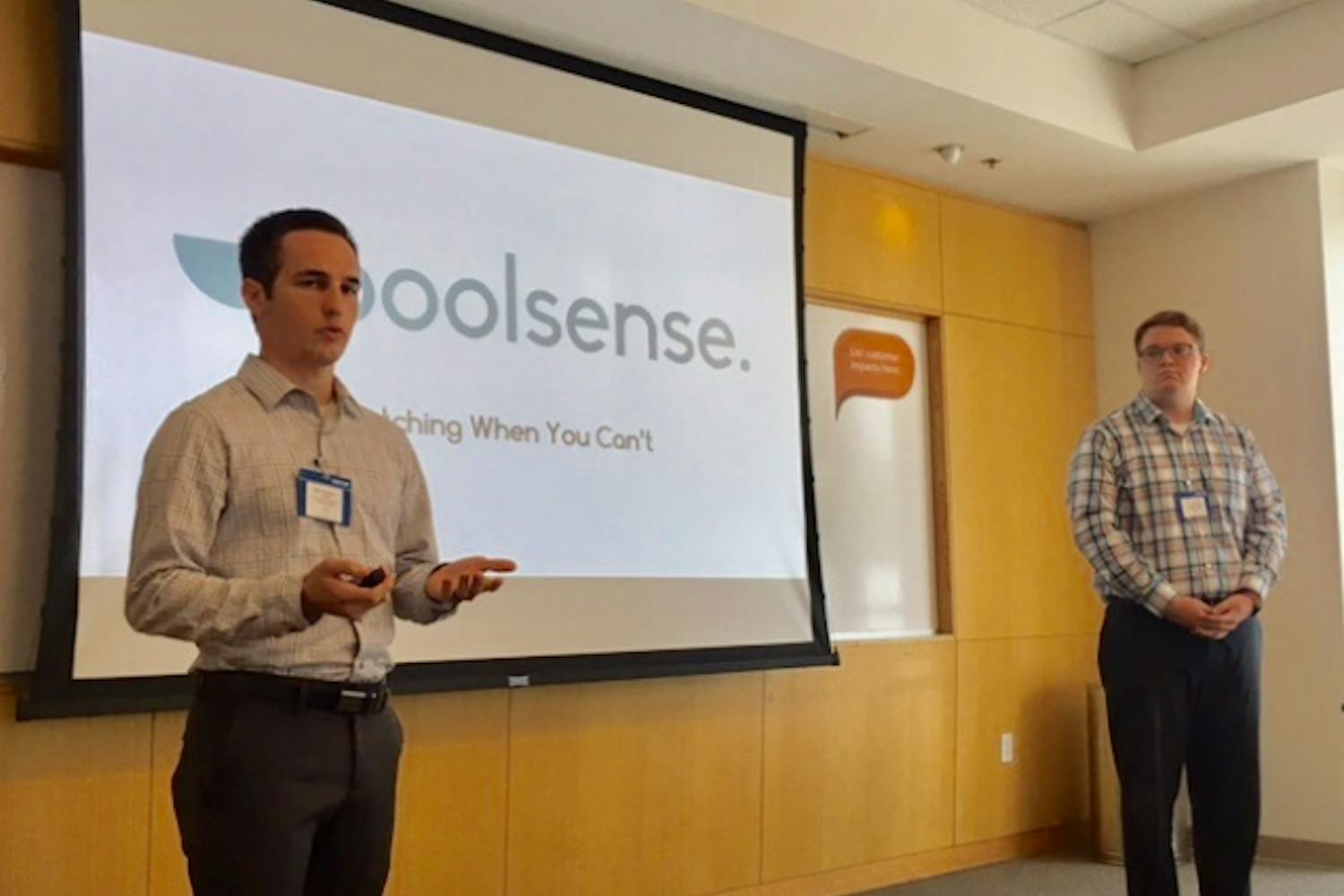 Kevin Hale,&nbsp;left and Grayson Allen present the Poolsense app in Tempe, Arizona.