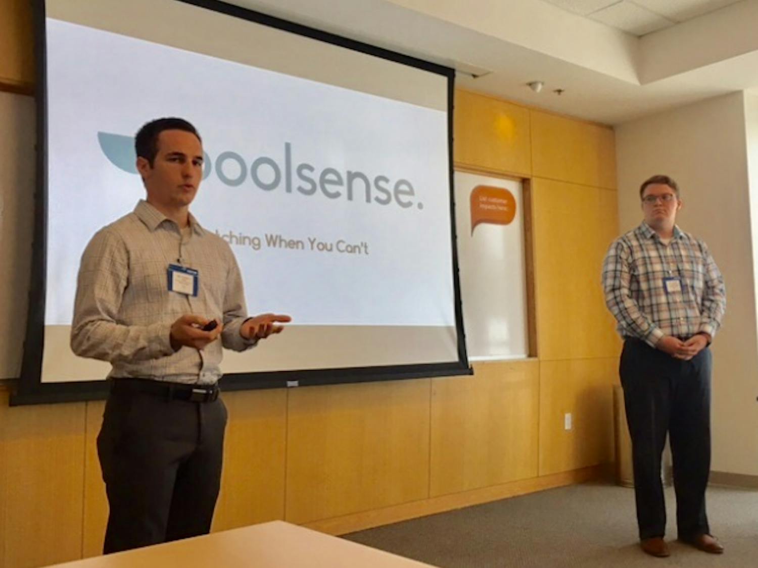 Kevin Hale,&nbsp;left and Grayson Allen present the Poolsense app in Tempe, Arizona.