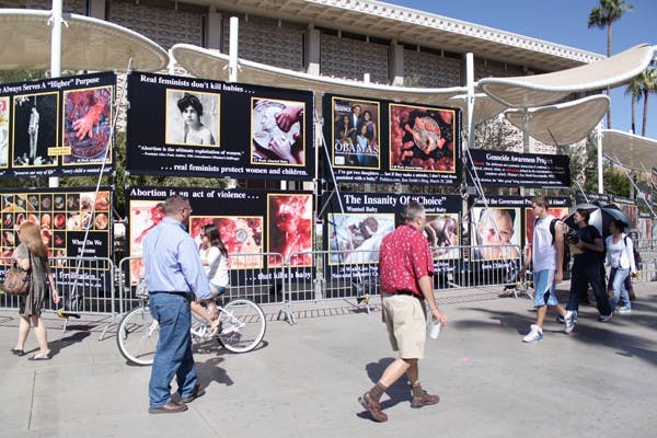 PROLIFE PROTEST: Students walking by the Memorial Union on Wednesday were greeted with graphic photos of abortions sponsored by the organization abortionno.org. (Photo by Beth Easterbrook)