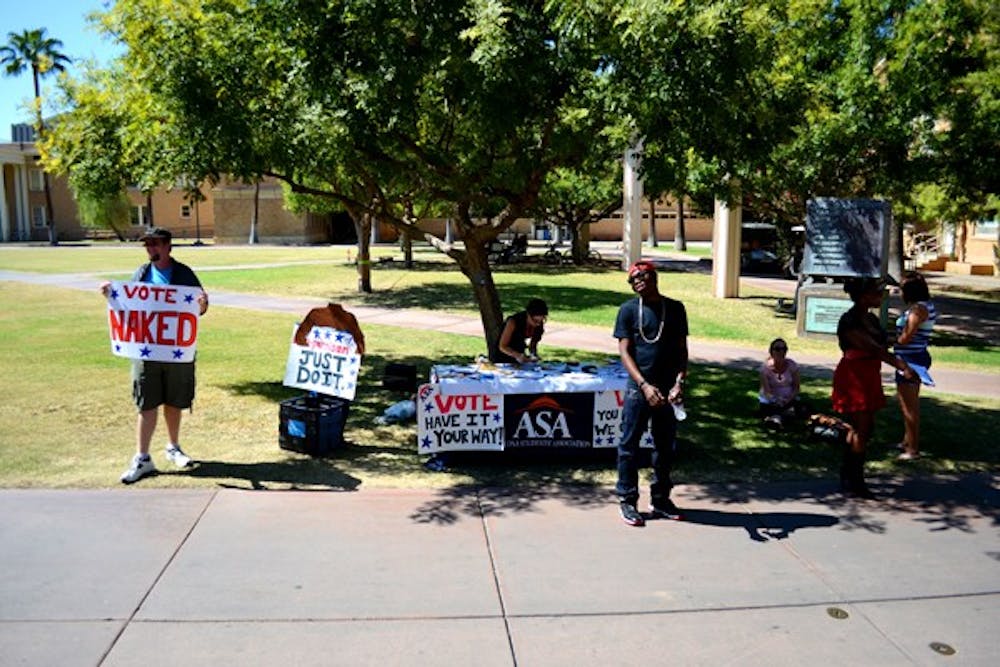 Members of ASA encourage students to vote with their Vote Naked campaign.  (Photo by Kurtis Semph)