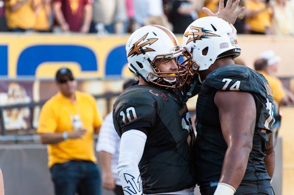 , Saturday, Nov. 8, 2014 at Sun Devil Stadium in Tempe. (Photo by Ben Moffat)