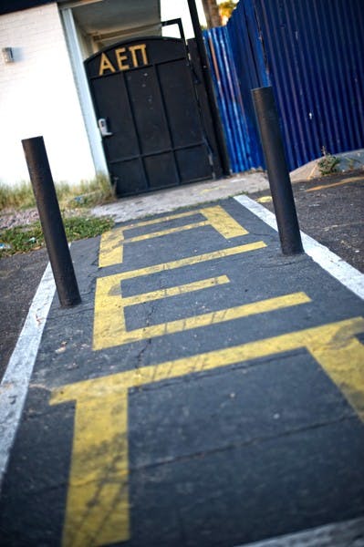 IN HOT WATER:  The entrance of the Alpha Epsilon Pi house is seen during the twilight hour on Tuesday night. AEPi, which had its recognition revoked by ASU in 2010, is one of a number of fraternities and sororities that are currently being reprimanded by the University for various incidents, including underage drinking, arrests and a rape allegation. (Photo by Michael Arellano)