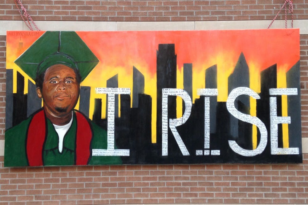 The 'Still I Rise' mural, featuring Michael Brown, pictured on the ASU West campus.