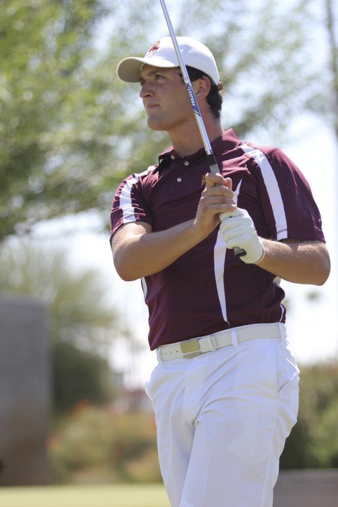 Sophomore Jon Rahm takes a swing during a men's golf meet. The Sun Devil's gold team understands that it must adjust to each individual course, especially when they play away. (Photo by State Press Staff)