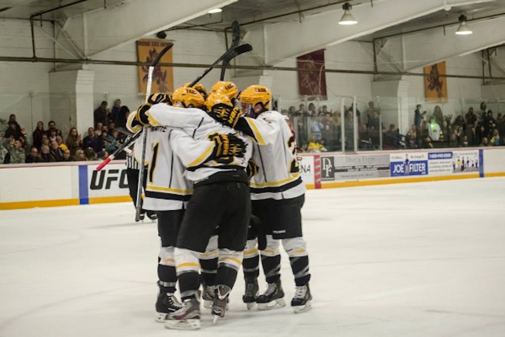 The Sun Devils celebrate after a goal to break a 2-2 tie on Saturday, Jan. 11. ASU won 4-2 over Oklahoma.(Photo by Alyssa Pakes)