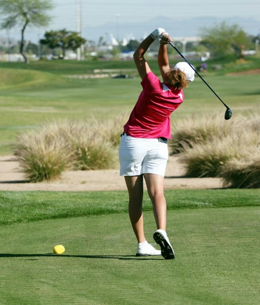 NOT QUITE THERE: Senior Giulia Molinaro drives the ball off the tee during last season’s PING/ASU Invitational. Despite solid performances by Molinaro and sophomore Justine Lee, the women’s golf team slid to seventh in the Stanford Intercollegiate over the weekend. (Photo by Beth Easterbrook)