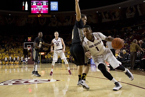 Sophomore guard Jahii Carson takes the ball to the hoop against the Retrievers in Tempe, Friday Nov. 8. The Sun Devils defeated USMB 