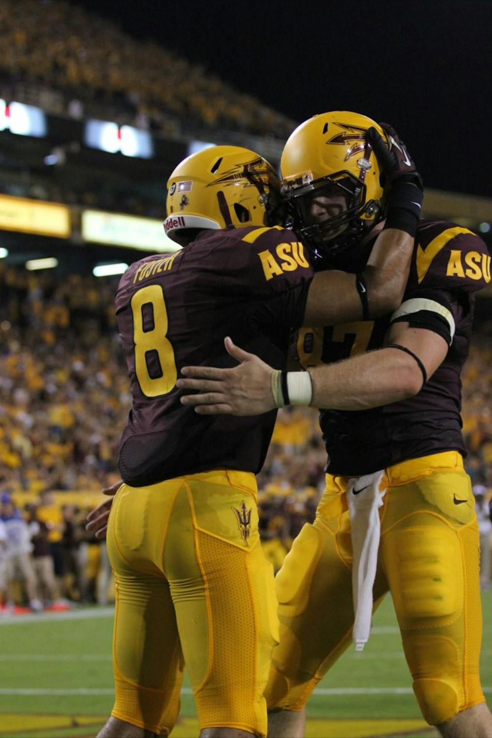 Sophomore running back D.J. Foster celebrates a touchdown during a game at home in Tempe. 