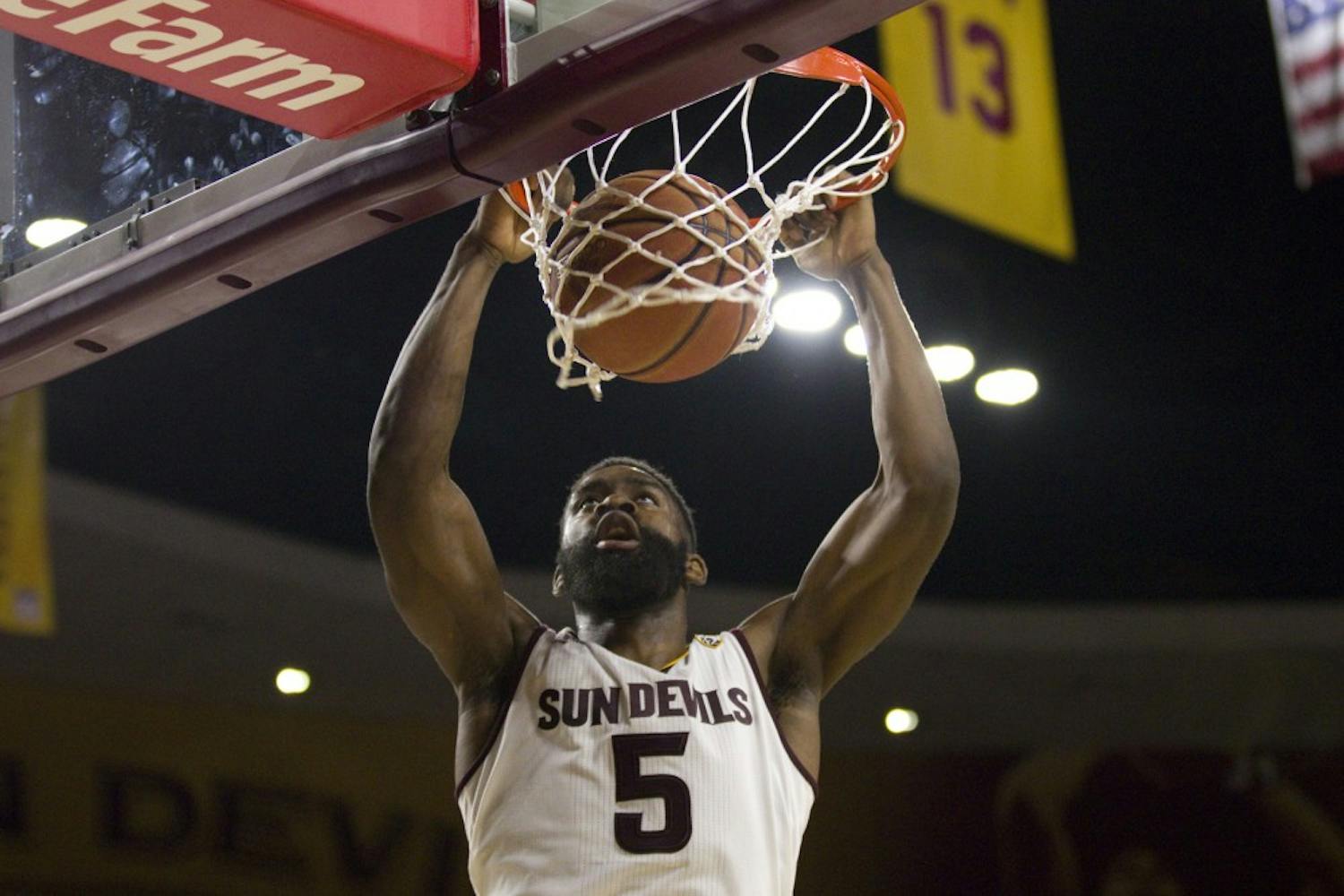 ASU senior forward Obinna Oleka (5) finishes a dunk during a men's basketball game against the University of California Golden Bears in Wells Fargo Arena in Tempe, Arizona, on Wednesday, Feb. 8, 2017. ASU lost the game 68-43. (Josh Orcutt/State Press)
