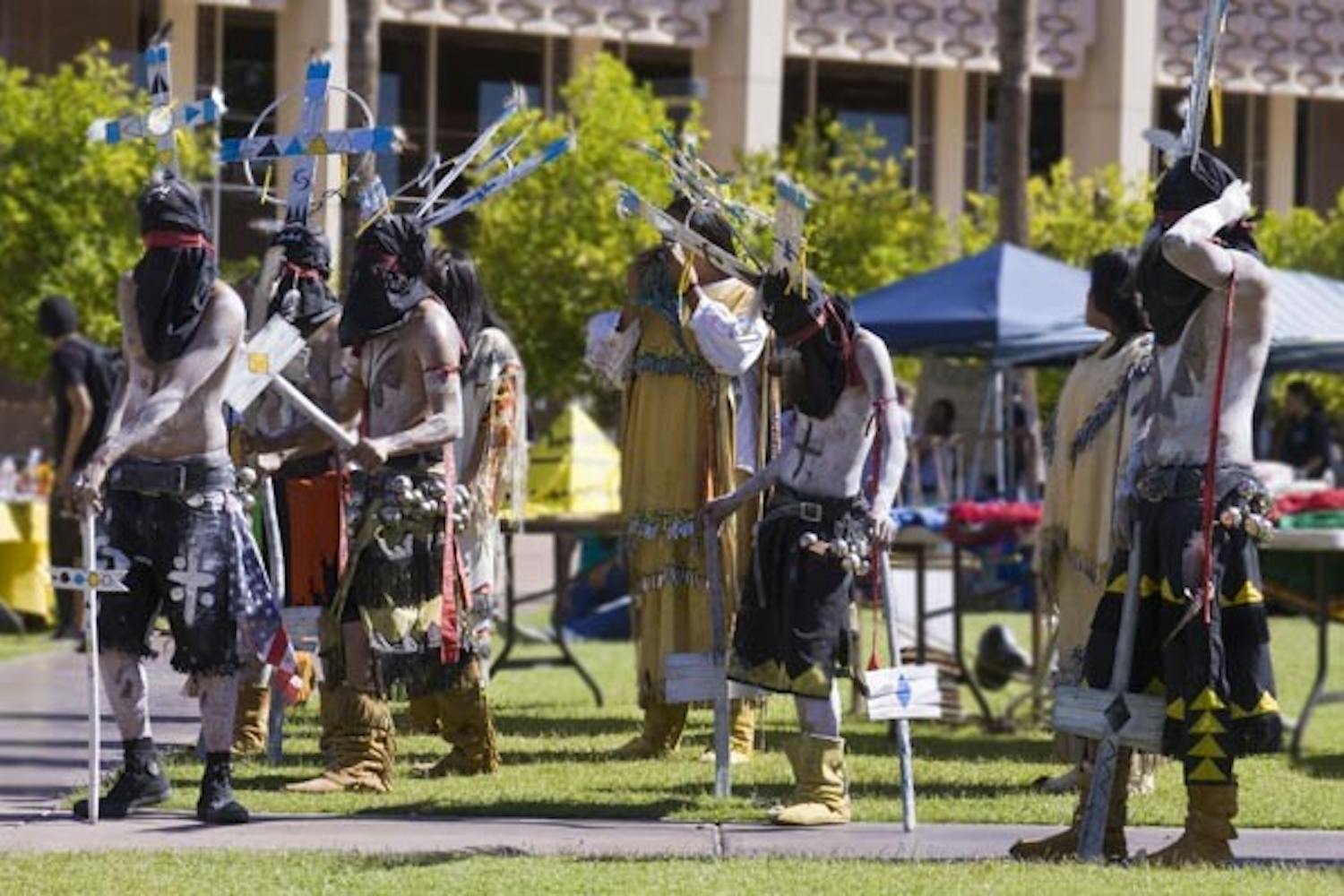 GOING NATIVE: Dancers perform at the Native American Festival on Hayden Lawn Monday afternoon. (Photo by Annie Wechter)