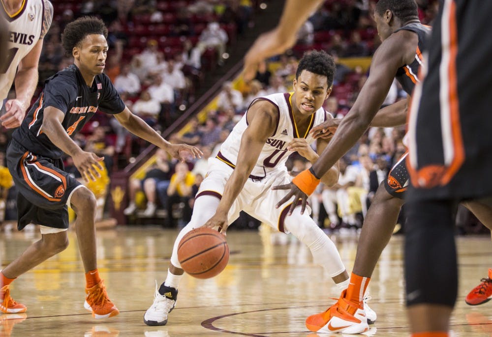 Arizona State Sun Devils guard Tra Holder (0) pushes into the key during a game against the Oregon State Beavers at Wells Fargo Arena in Tempe, Arizona, on Thursday, Jan. 28, 2015. The Sun Devils took the win over the Beavers, 86-68.