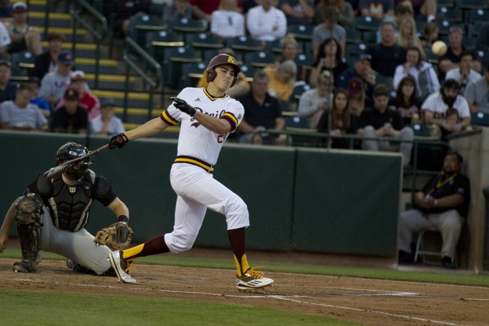 ASU freshman outfielder Hunter Bishop (24) hits a ball foul during a baseball game against the UNLV Rebels at Phoenix Municipal Stadium in Phoenix, Arizona on Tuesday, March 28, 2017. ASU won 5-4.