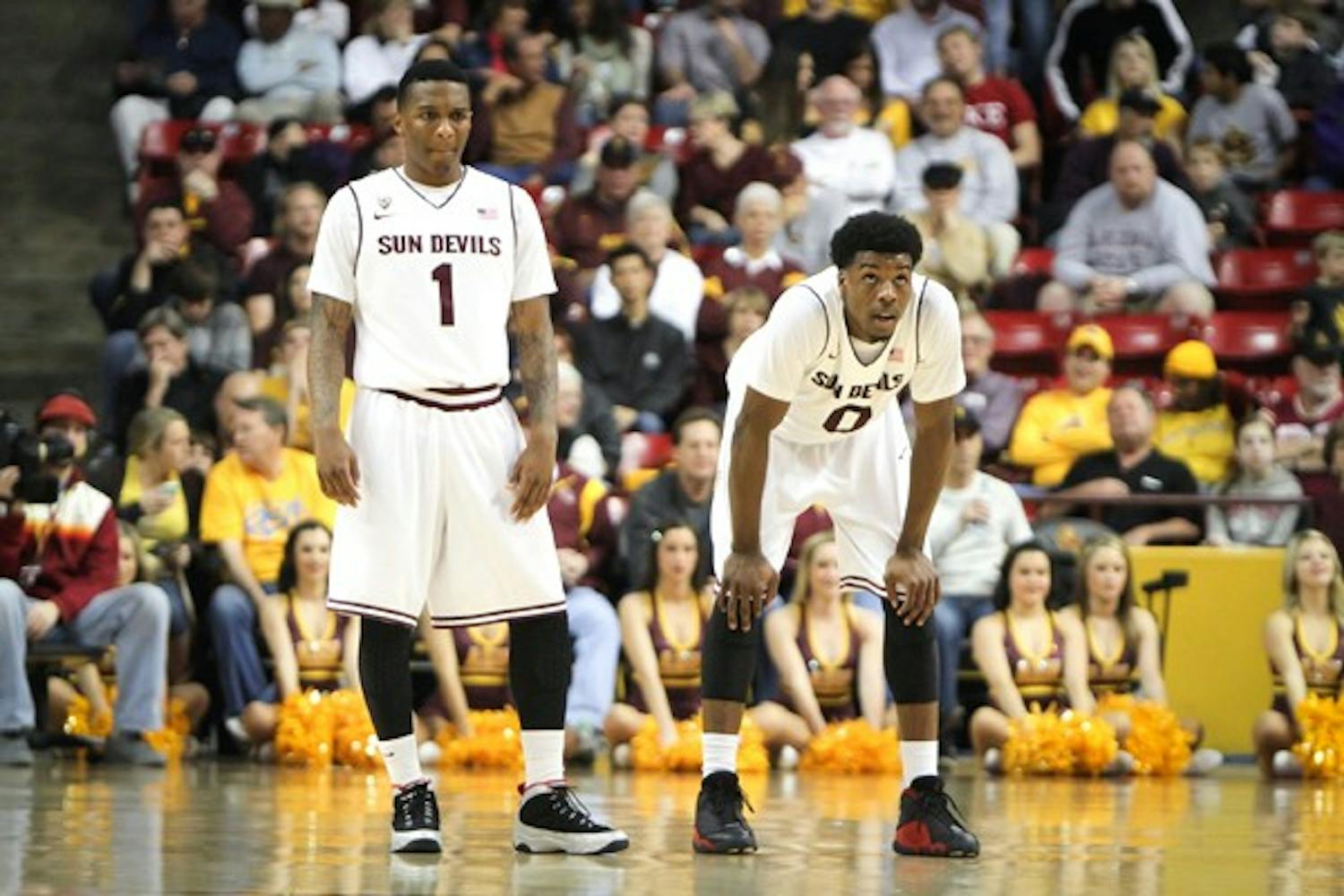 Carson and Felix catch a breath during a break in the action against Stanford on Feb. 10. (Photo by Samuel Rosenbaum)