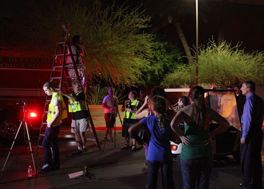PHOTO COURTESY OF AMY DICKSON
SAFETY FIRST: ASU recently collaborated with Tempe Fire and Police departments for scenes in a new safety training video filmed on campus.
