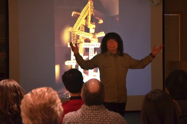 At the ASU Art Museum, with a projector and a humorous narrative, Professor and Ph.D Supervisor of Sichuan University, Dr. He Gong, inspires students to seek their artistic voices, create powerful art, and even travel abroad to discover the world in hopes of capturing it. (Photo by Rachel Nemeh)