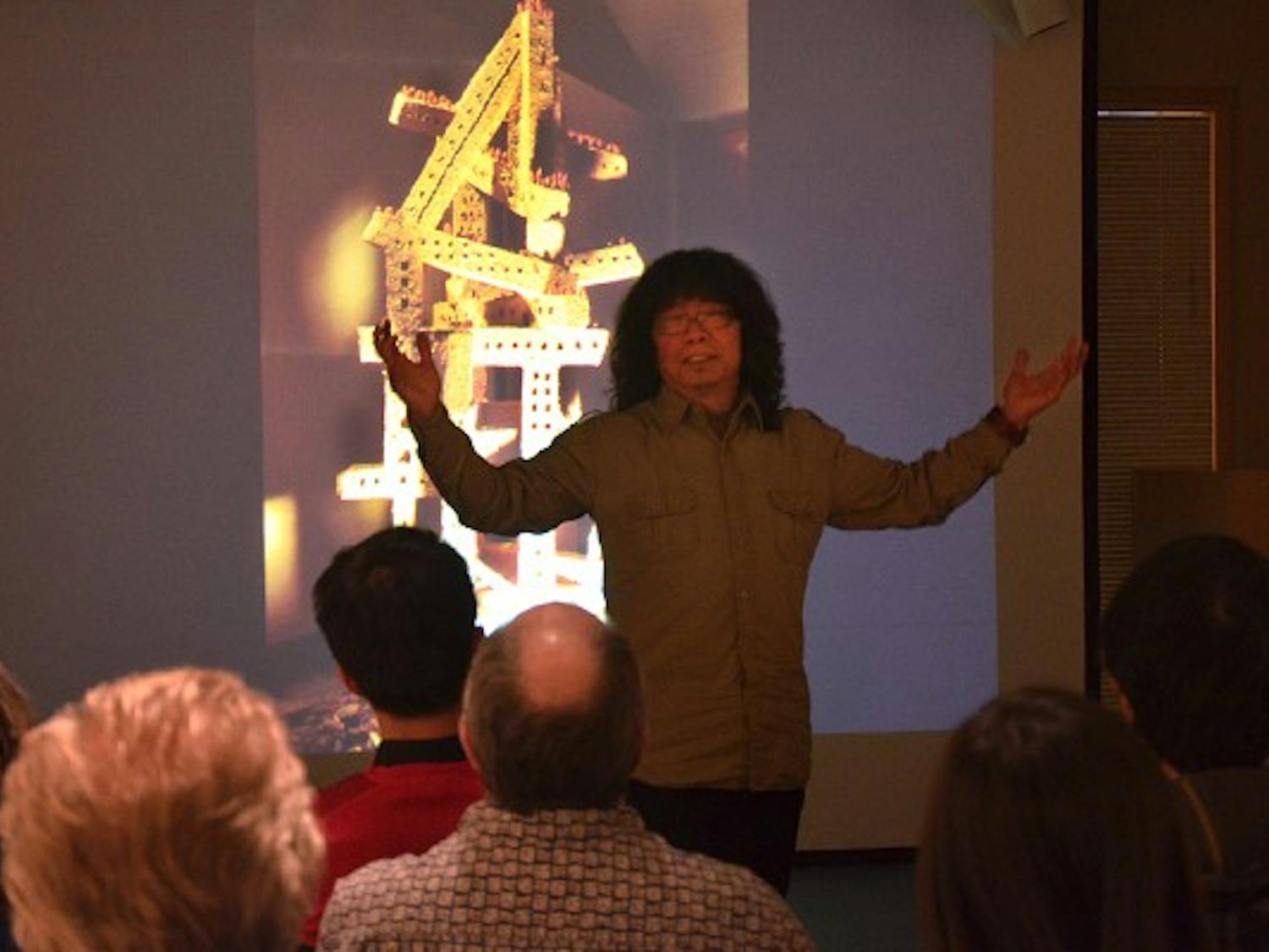 At the ASU Art Museum, with a projector and a humorous narrative, Professor and Ph.D Supervisor of Sichuan University, Dr. He Gong, inspires students to seek their artistic voices, create powerful art, and even travel abroad to discover the world in hopes of capturing it. (Photo by Rachel Nemeh)