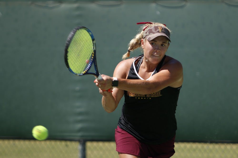 ASU senior Kassidy Jump competes in a singles match against University of Arizona at the Whiteman Tennis Center in Tempe, Arizona on Saturday, April 22, 2017.