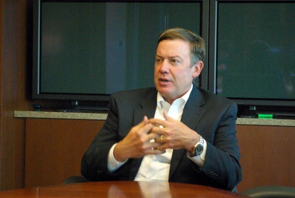 Budget talks: ASU President Michael Crow addresses the potential effects of University budget cuts Tuesday in a meeting with The State Press editorial board. (Photo by Nathan Meacham)