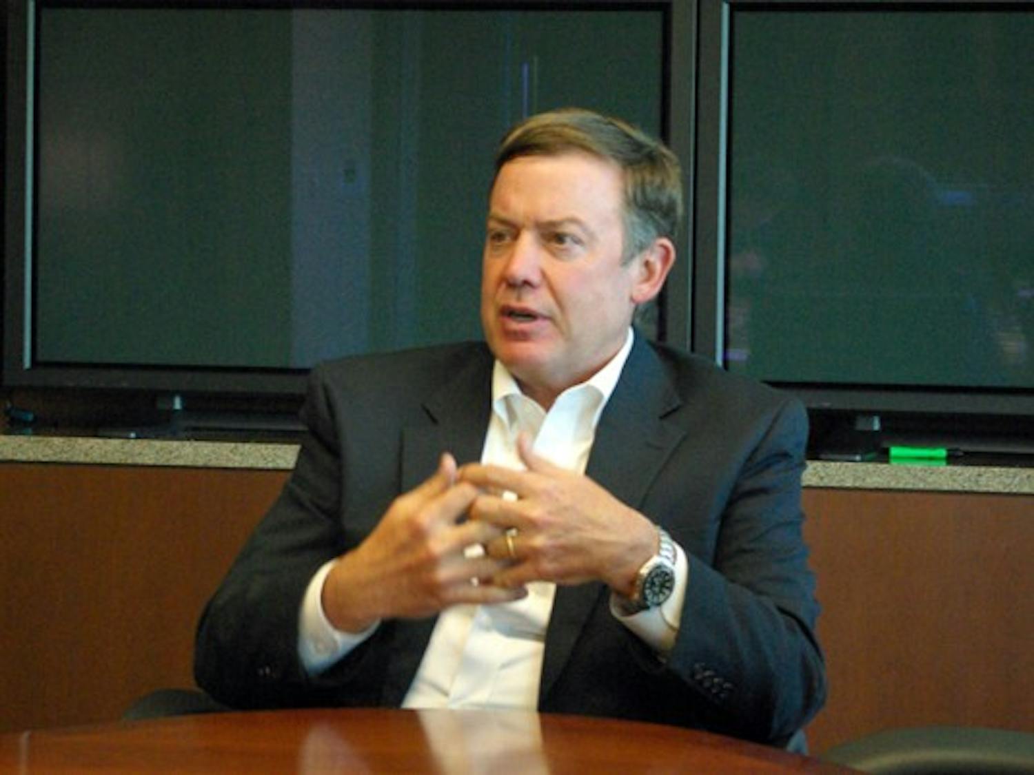 Budget talks: ASU President Michael Crow addresses the potential effects of University budget cuts Tuesday in a meeting with The State Press editorial board. (Photo by Nathan Meacham)