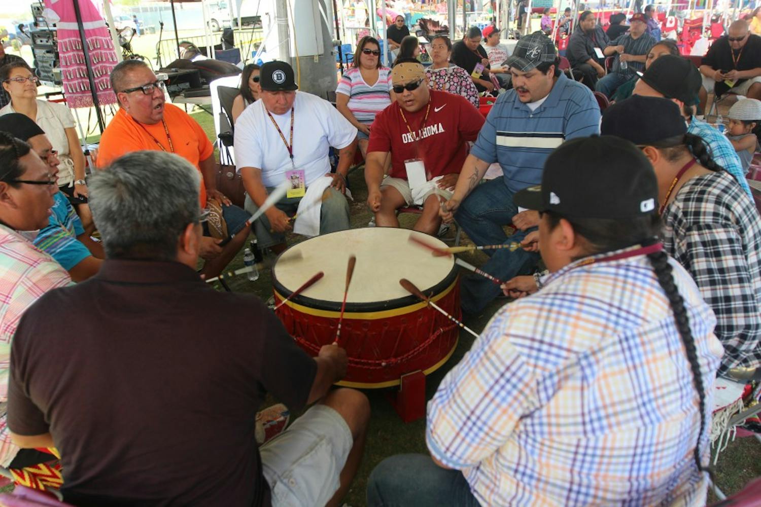Ritual drummers at ASU’s powwow event beat rhythmically as members of various tribes dance to the beat. At ASU, members from over 60 different tribes attend classes. (Photo By Dominic Valente)