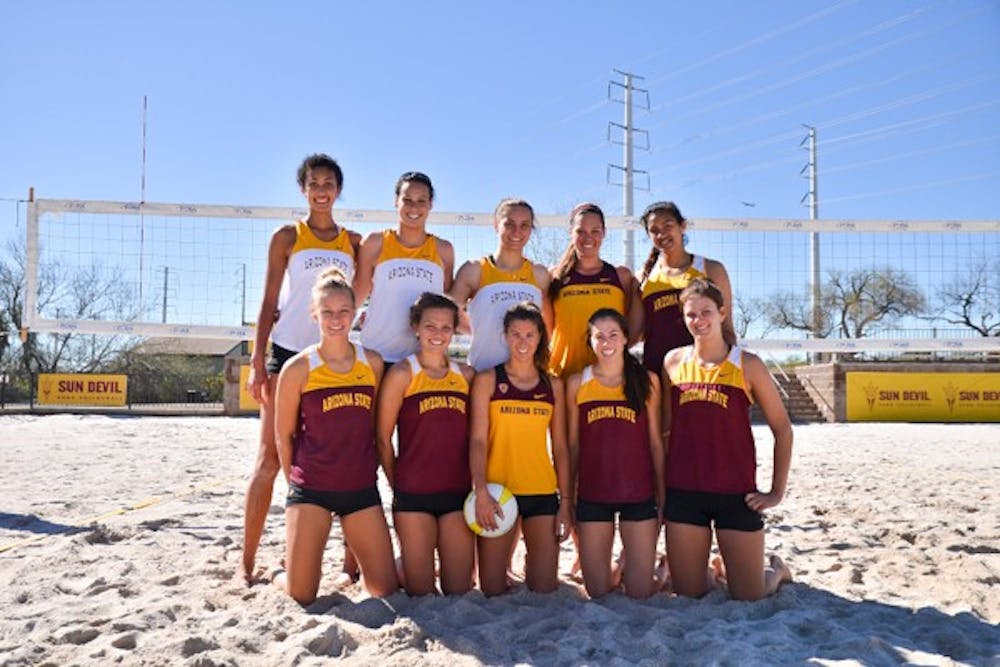 ASU sand volleyball members pose for a picture at the PERA Club after a practice. 2014 is the first year for ASU sand volleyball.