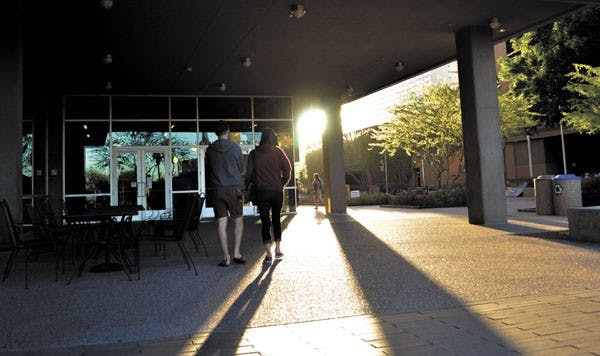 Students meander to their early Monday morning classes at the Walter Cronkite School of Journalism and Mass Communication on the downtown Phoenix campus as the sun begins to rise. (Photo by Danielle Gregory)