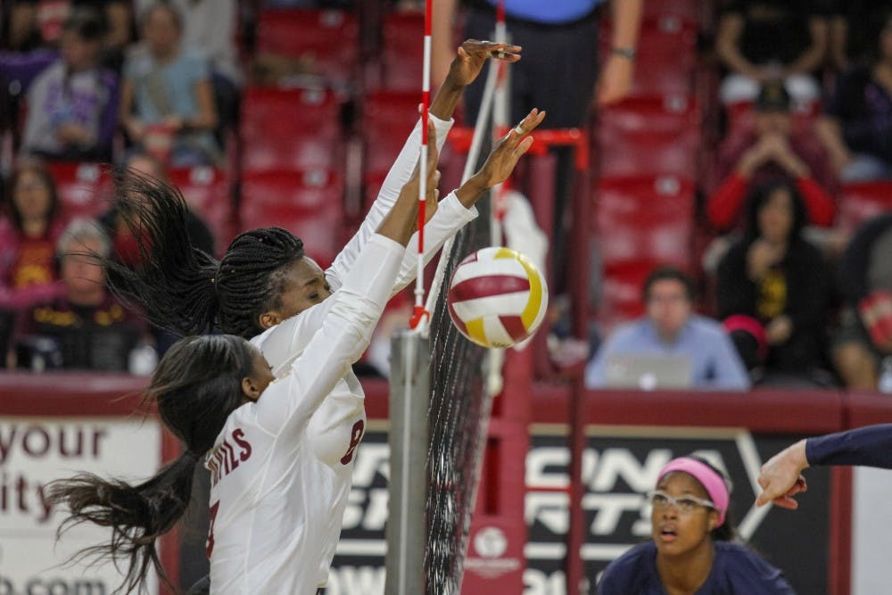 Senior Maya Mcclendon and freshman Mmachi Nwoke block a shot at an ASU volleyball game against Cal in Tempe, Arizona, on Saturday, Nov. 19, 2016.