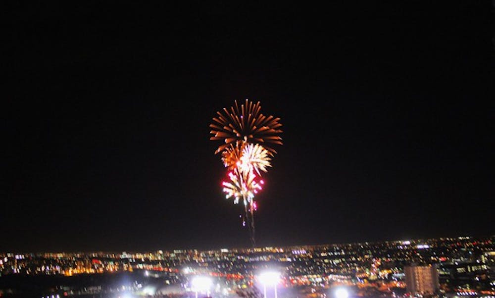 Fireworks shoot into the air above Sun Devil Stadium, after ASU's last touchdown during the ASU vs. Oregon game Thursday night.  (Photo by Jenn Allen)
