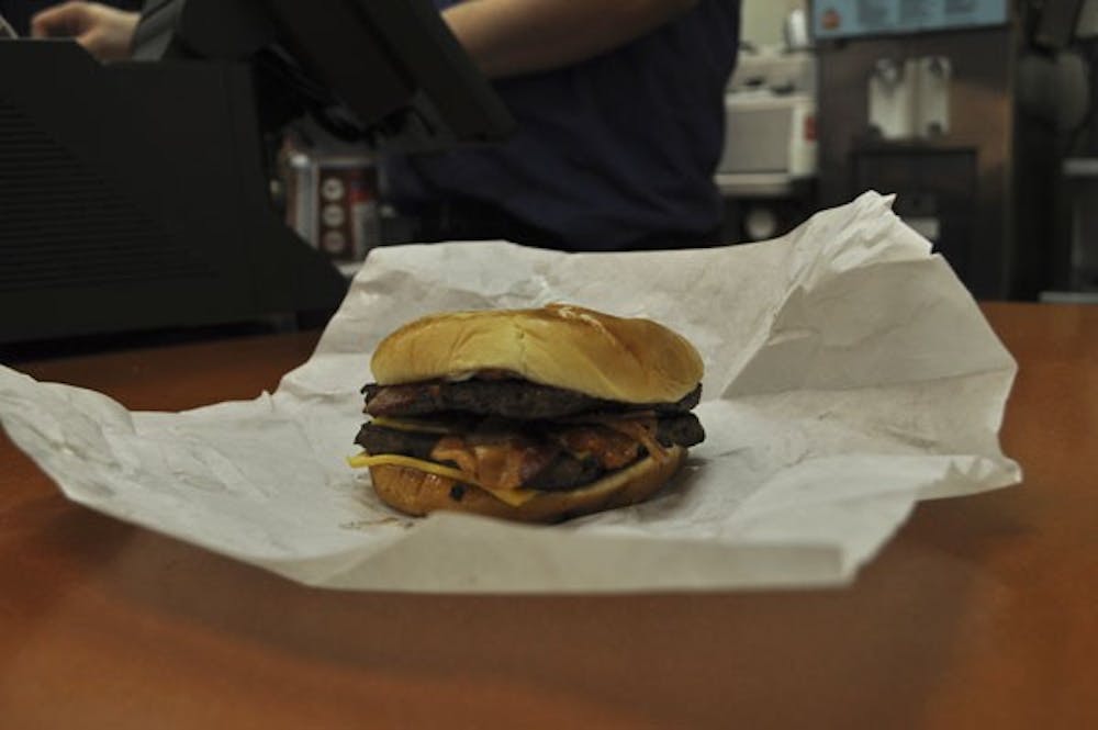 Wendy's Baconator comes with two beef patties, applewood smoked bacon, a toasty bun, mayo, ketchup and American cheese totaling 970 calories. Wendy's will bring its Baconator challenge to ASU today and give away free Son of Baconators. (Photo by Danielle Gregory)