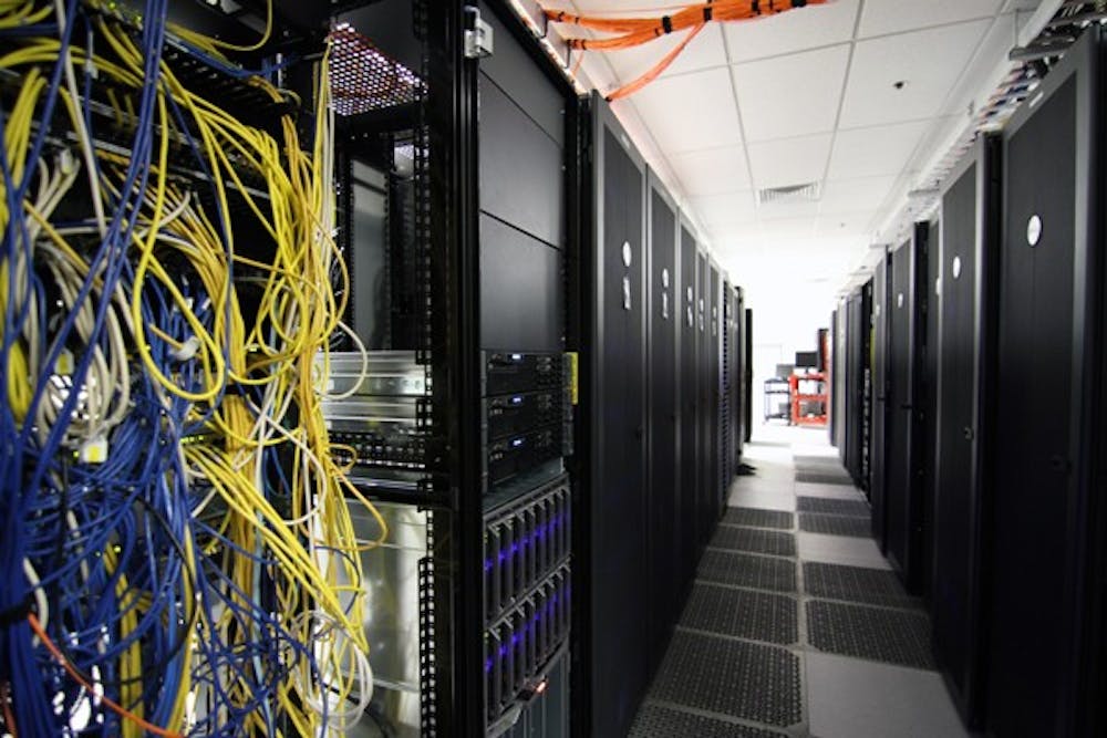 ASU’s Saguaro 2 Supercomputer, located in the Barry M. Goldwater Center for Science and Engineering, contains about 5,000 processor cores and computes research data 24/7. (Photo by Lisa Bartoli)