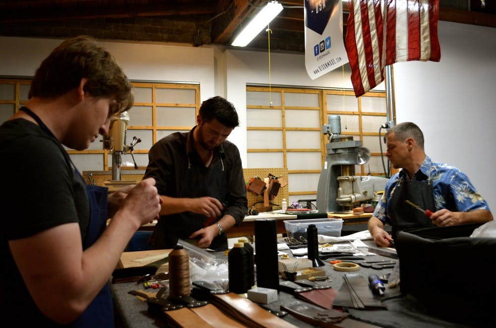 The men of Bison Made work towards perfection.
Photo by Luu Nguyen