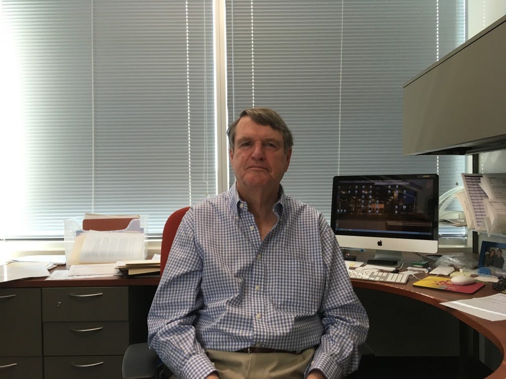 ASU professor&nbsp;Len Downie Jr. poses for a photo in his office on Feb. 22, 2017.