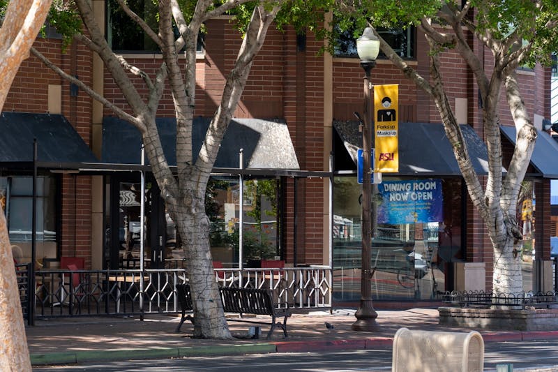 An ASU Community of Care sign is pictured on Mill Ave. on Friday, Sept. 25, 2020, in Tempe. ASU and the City of Tempe have teamed up to promote health and safety measures for the COVID-19 Pandemic.