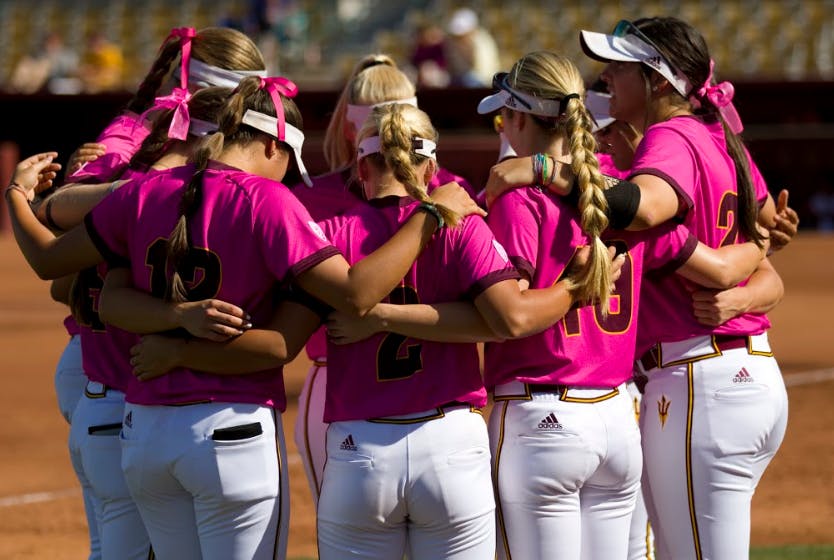 Part of the ASU softball team huddles up before game two of a softball series versus the No. 10-ranked Utah Utes at Alberta B. Farrington Softball Stadium in Tempe, Arizona on Saturday, April 22, 2017. ASU lost 7-6.