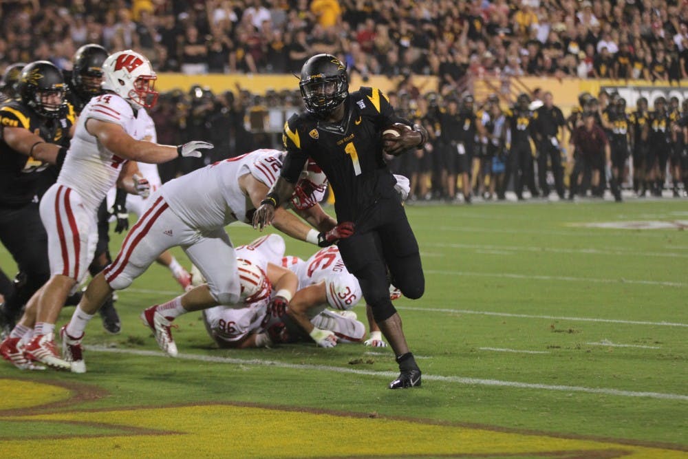 Senior running back Grace Marion runs into the end zone against Wisconsin in Tempe on Saturday. The Sun Devils won at home 30-32. (Photo by Dominic Valente)