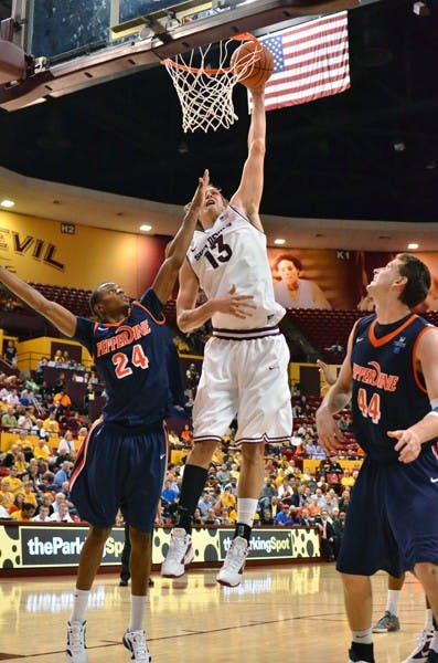 Jordan Bachynski dunks the ball against Pepperdine on Nov. 15, 2011. The Sun Devils have struggled to find consistency this season. (Photo by Aaron Lavinsky)