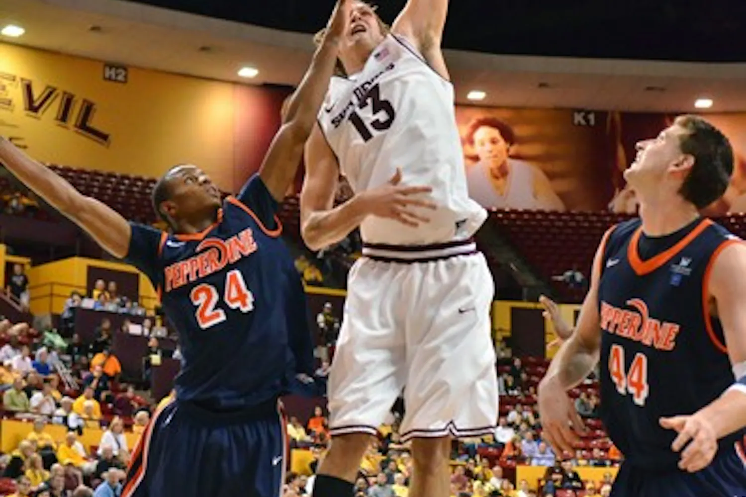 Jordan Bachynski dunks the ball against Pepperdine on Nov. 15, 2011. The Sun Devils have struggled to find consistency this season. (Photo by Aaron Lavinsky)