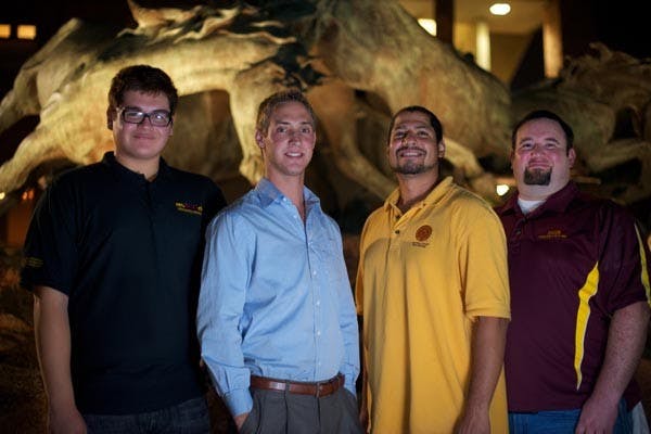 PRESIDENTIAL GATHERING: USG Presidents (from left) Christian Vasquez (Downtown), Jacob Goulding (Tempe), Dominick Hernandez (Polytechnic), and Daniel Hatch (West) gather in front of the W.P. Carey school on the Tempe campus. (Photo by Michael Arellano)