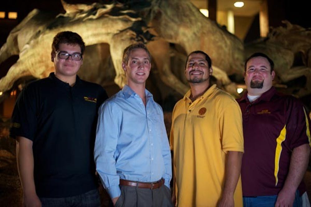 PRESIDENTIAL GATHERING: USG Presidents (from left) Christian Vasquez (Downtown), Jacob Goulding (Tempe), Dominick Hernandez (Polytechnic), and Daniel Hatch (West) gather in front of the W.P. Carey school on the Tempe campus. (Photo by Michael Arellano)