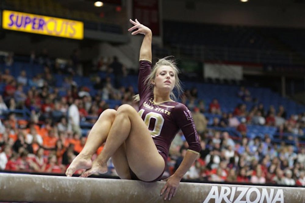 TOUGH OUTING: ASU junior Mary Atkinson performs her balance beam routine during the Pac-10 Championships on Saturday at McKale Center in Tucson. The Sun Devils finished last with a score of 190.675. (Photo courtesy of Steve Rodriguez)