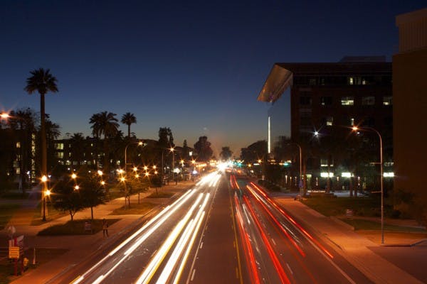 CITY LIGHTS: Cars travel down University Drive, one of the busiest streets in Tempe.  Bloomberg Businessweek named Tempe the third most "fun affordable" city. (Photo by Lisa Bartoli)