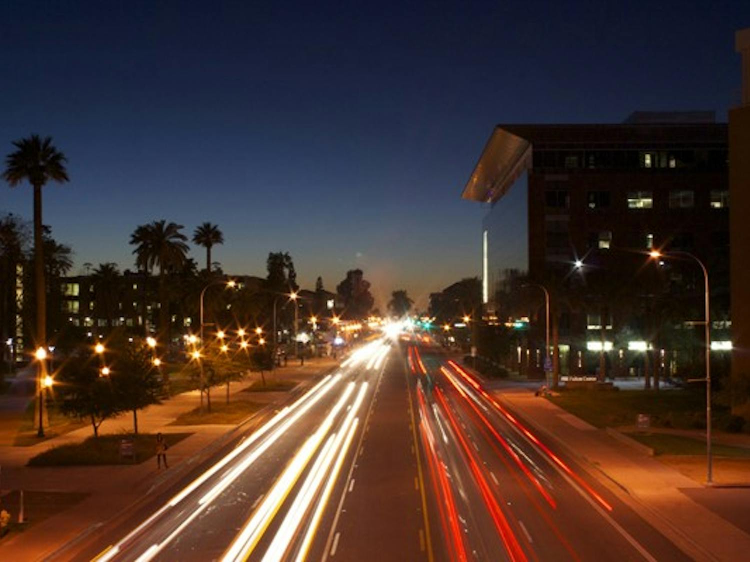 CITY LIGHTS: Cars travel down University Drive, one of the busiest streets in Tempe.  Bloomberg Businessweek named Tempe the third most "fun affordable" city. (Photo by Lisa Bartoli)