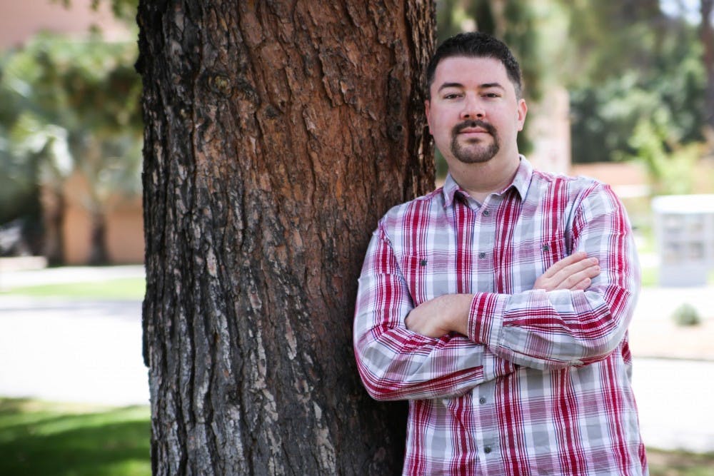 John Perovich, third year MFA Dramatic writing major at ASU and author of the play "On Display", poses for a portrait on Tuesday, April 5, 2016.