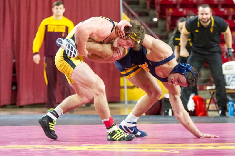 Four individuals take first place for ASU wrestling in Daktronics Open