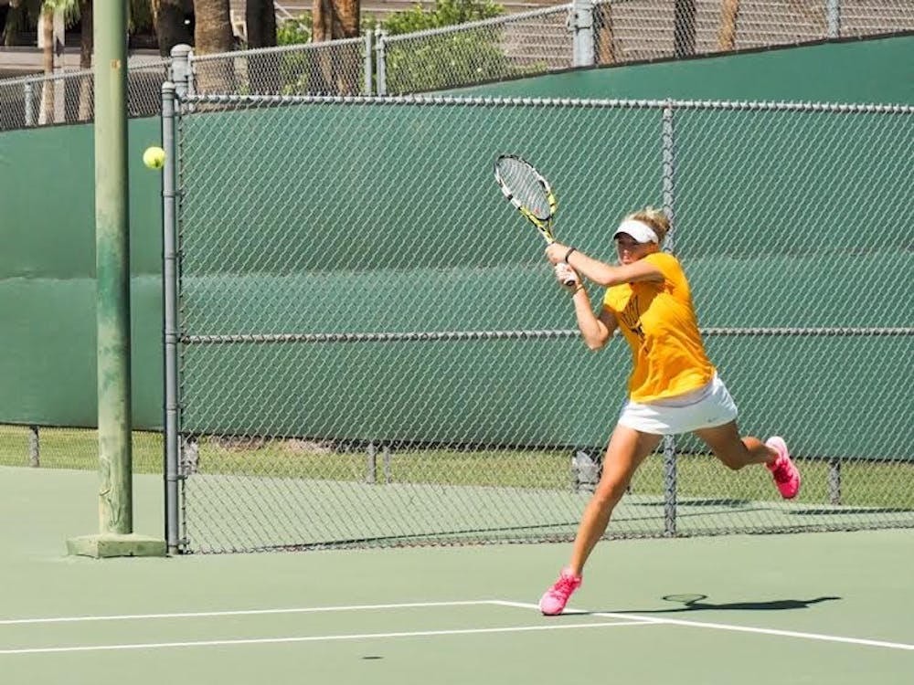 Senior Joanna Smith returns the San Jose State serve during a double's match, Friday, March 20, 2015, at Whiteman Tennis Center in Tempe. (J. Bauer-Leffler/The State Press)