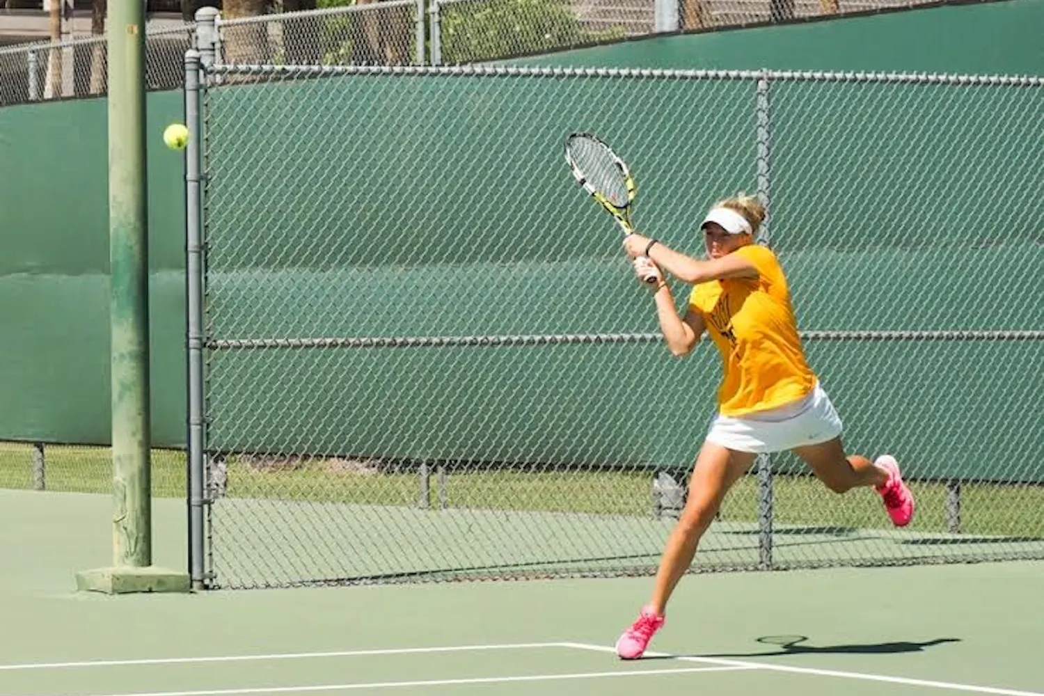 Senior Joanna Smith returns the San Jose State serve during a double's match, Friday, March 20, 2015, at Whiteman Tennis Center in Tempe. (J. Bauer-Leffler/The State Press)
